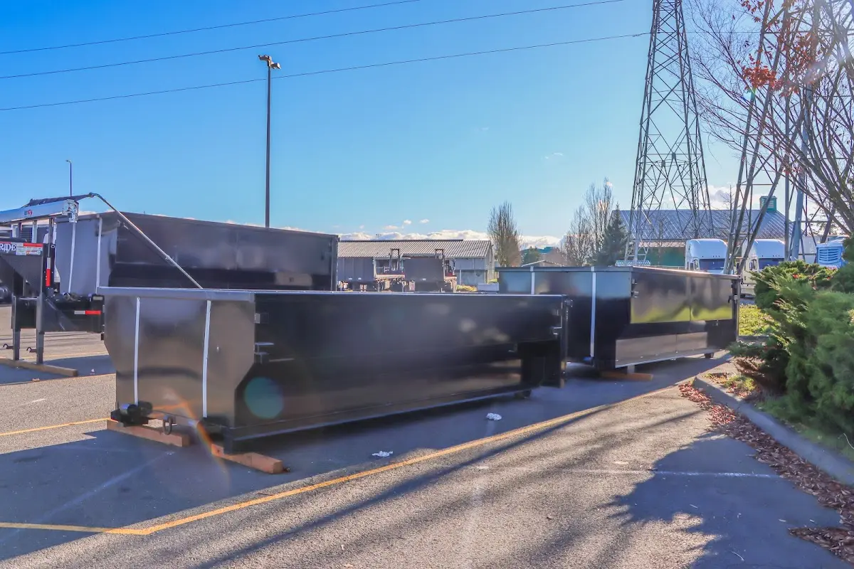 Roll-off dumpster ready for waste disposal at job site for Construction Dumpster Rental in Victoria